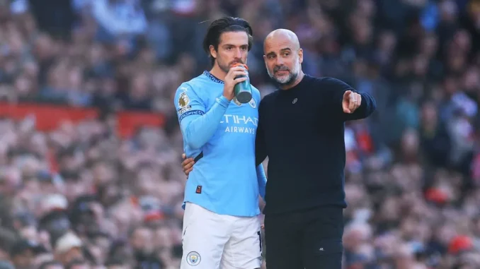 jack-grealish-pep-guardiola-manchester-united-fc-v-manchester-city-fc-premier-league-min
