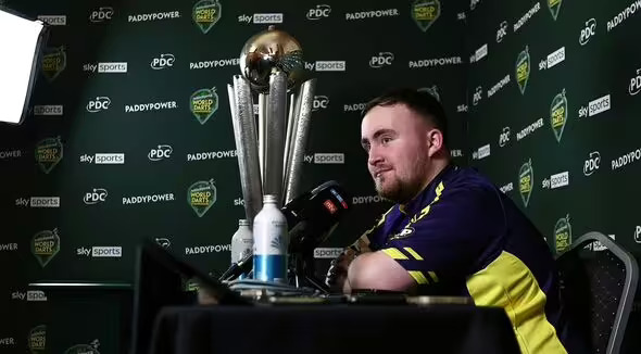 london-england-luke-littler-of-england-looks-on-from-beside-the-sid-waddell-trophy-during-a-6429728 (1)